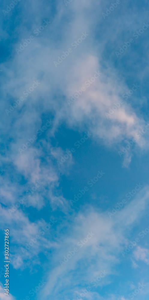 Obraz premium Fantastic clouds against blue sky, panorama