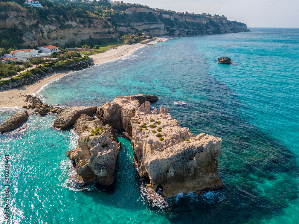 Aerial view of the Riaci rocks, Riaci beach near Tropea, Calabria. Italy. Transparent sea and wild coast. 