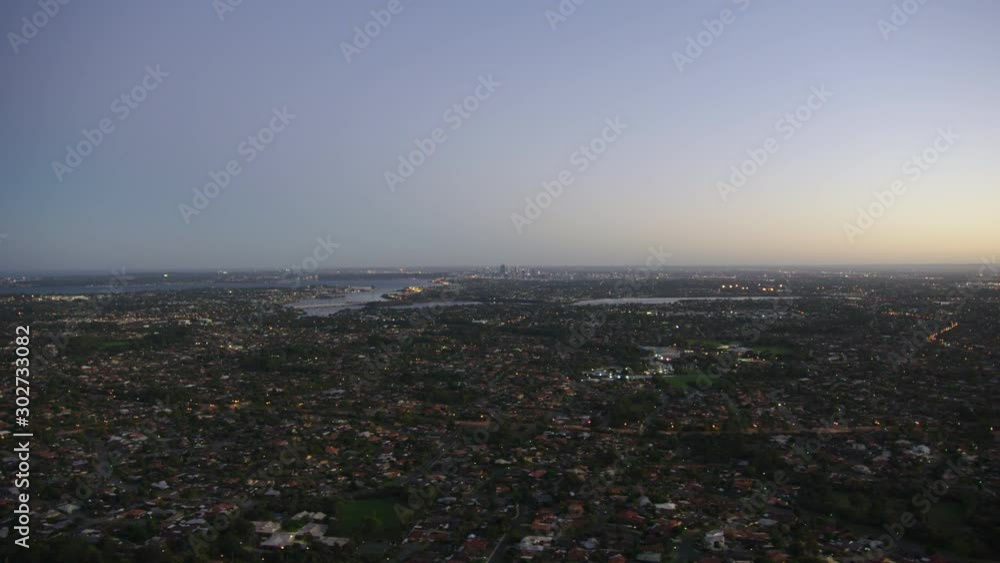 Aerial sunrise view Perth residential suburbs and bridges Aerial sunrise view Perth residential suburbs and bridges