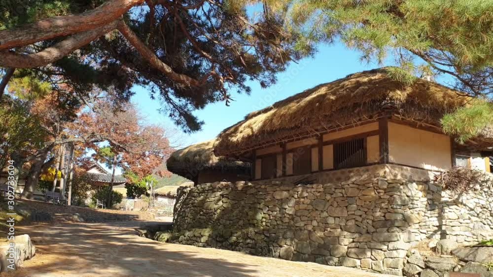 Korean Traditional House and Stone Wall Path on Fall Day Korean Traditional House and Stone Wall Path on Fall Day