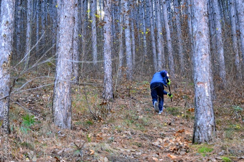 one boy in the woods