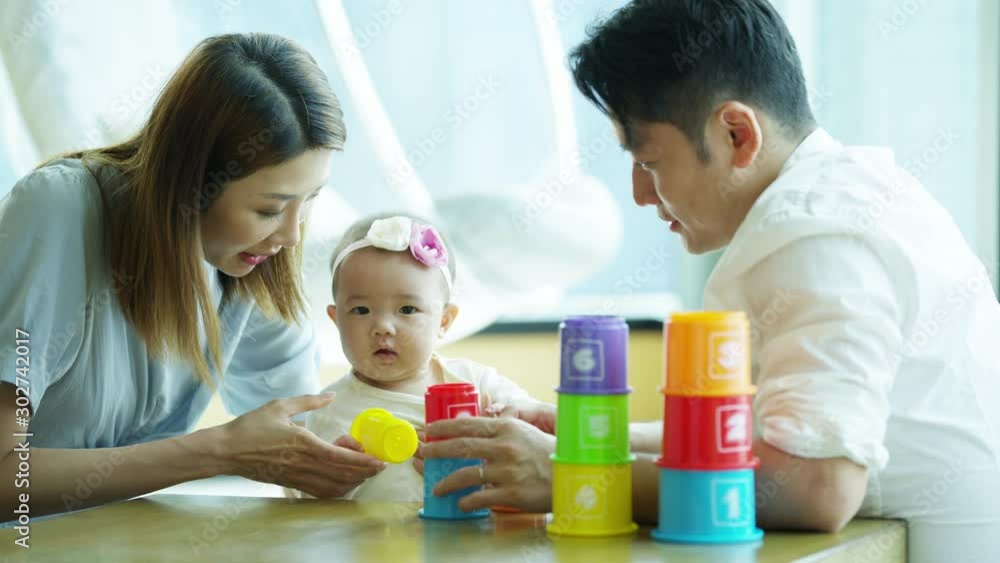 Chinese Asian parents teaching baby numbers colours education Chinese Asian parents teaching baby numbers colours education