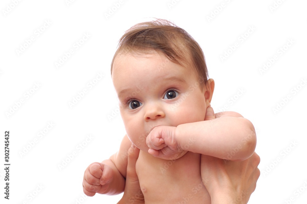 Cheerful little baby smiling and joying on mothers shoulder. Togetherness loving mother and happy newborn daughter Cheerful little baby smiling and joying on mothers shoulder. Togetherness loving mother and happy newborn daughter