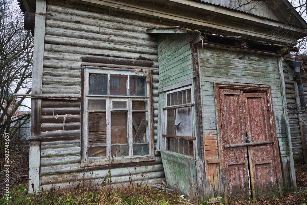 Abandoned building, broken Windows, old door Abandoned building, broken Windows, old door