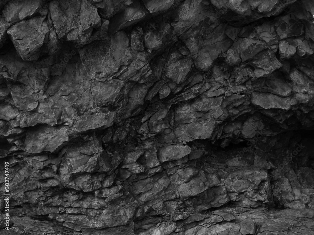 Black stone grunge texture. Dark gray rock background. Mountain close-up.  Black rock backdrop. Stock-Foto | Adobe Stock