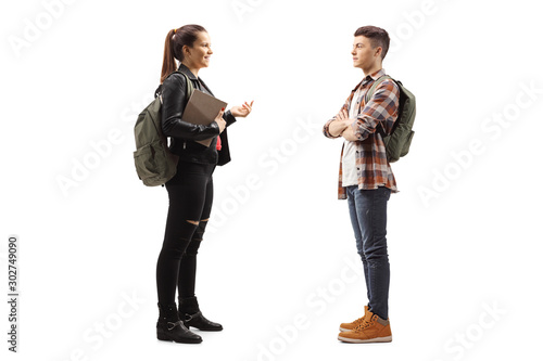 Female student talking to a male student