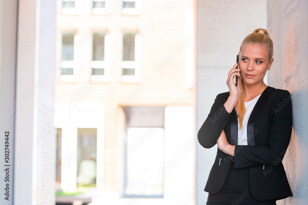 Outdoor photo of young and attractive businesswoman or student. Business and education concept. Outdoor photo of young and attractive businesswoman or student. Business and education concept.