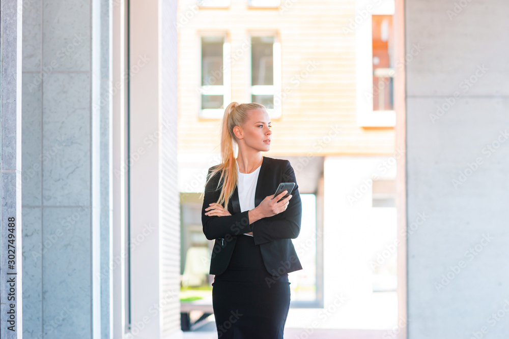 Outdoor photo of young and attractive businesswoman or student. Business and education concept. Outdoor photo of young and attractive businesswoman or student. Business and education concept.
