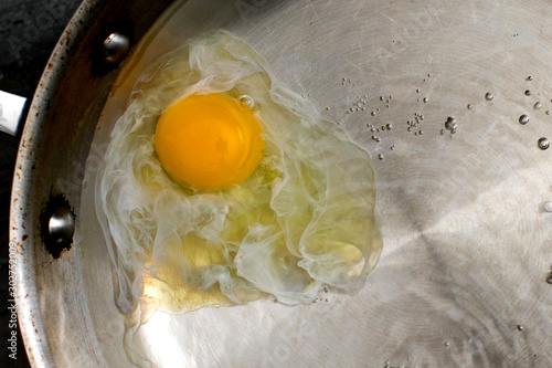 Poached egg on frying pan