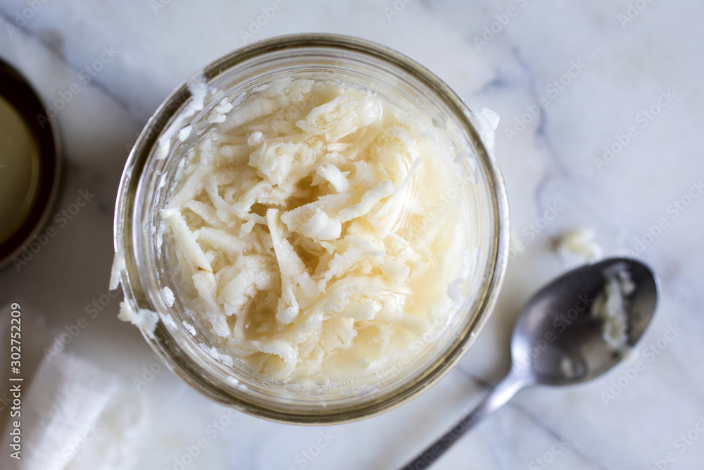 Overhead view of preserved horseradish†in jar Overhead view of preserved horseradish†in jar