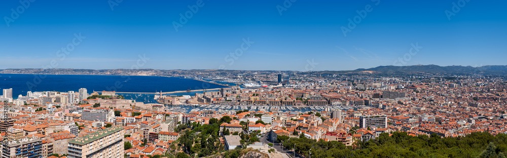 Marseille harbor. Panoramic summer view on Marseille rooftops with Vieux Port and the Mediterranean Sea. Bouches-du-Rhône (13), Provence-Alpes-Cote d'Azur, France, Europe