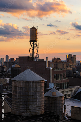 Photography Sunset light on Chelsea rooftops with water towers, Manhattan, New York City, US