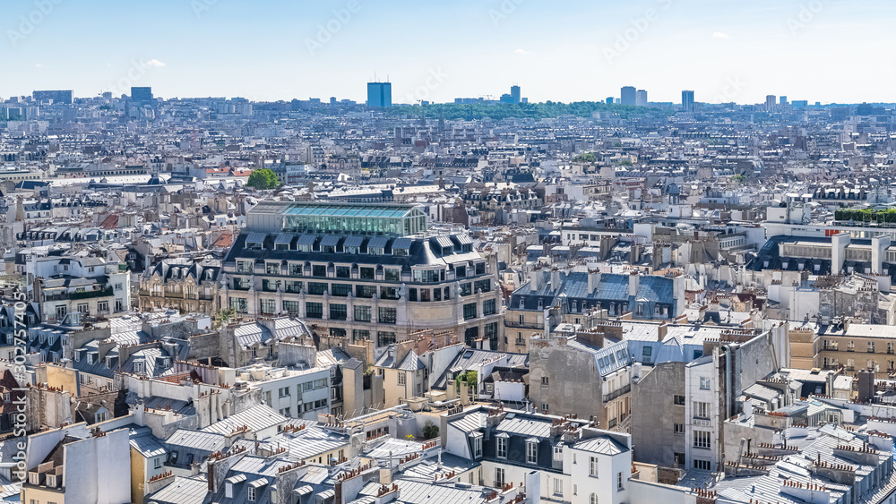 Paris, ancient and modern buildings in the center, typical parisian facade and windows, aerial view from the Saint-Jacques tower
