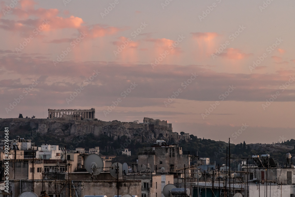 Television antennas over Athens buildings with Acropolis of Athens in background