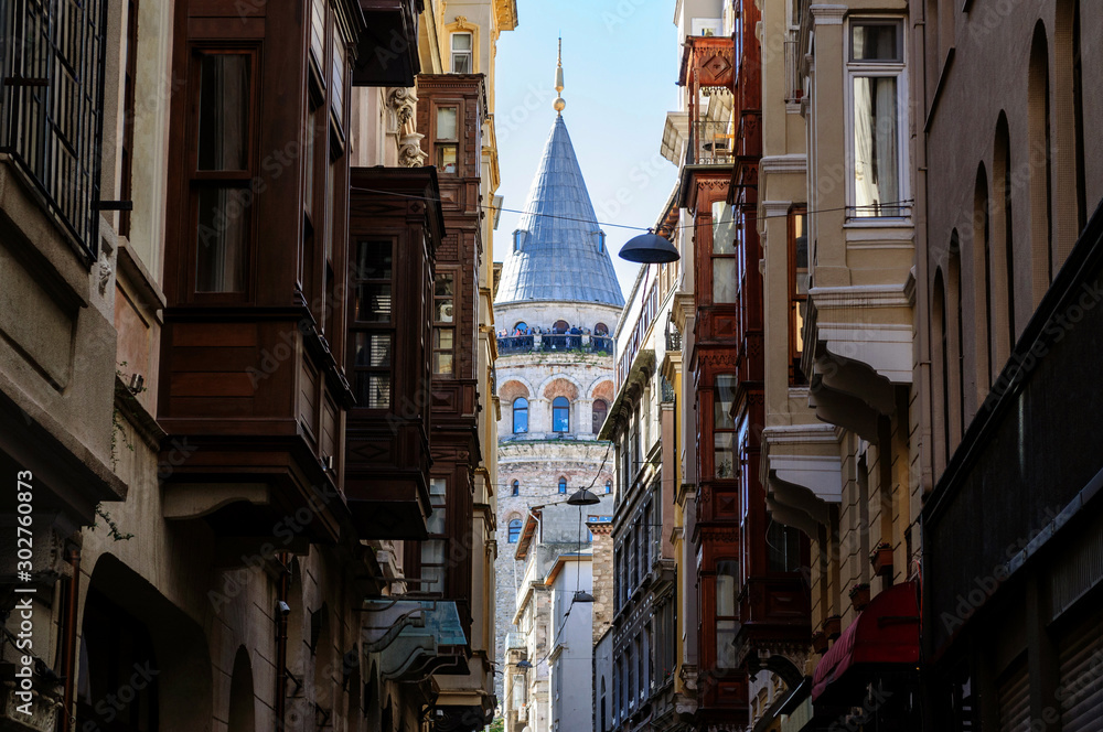 View of Galata tower from a narrow street, Istanbul.