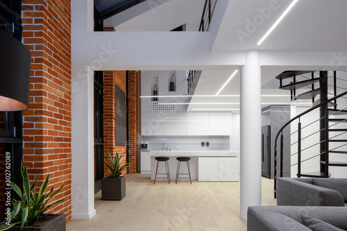 Spacious apartment with brick walls