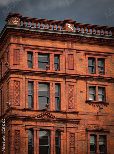 Photography facade of building made from red bricks