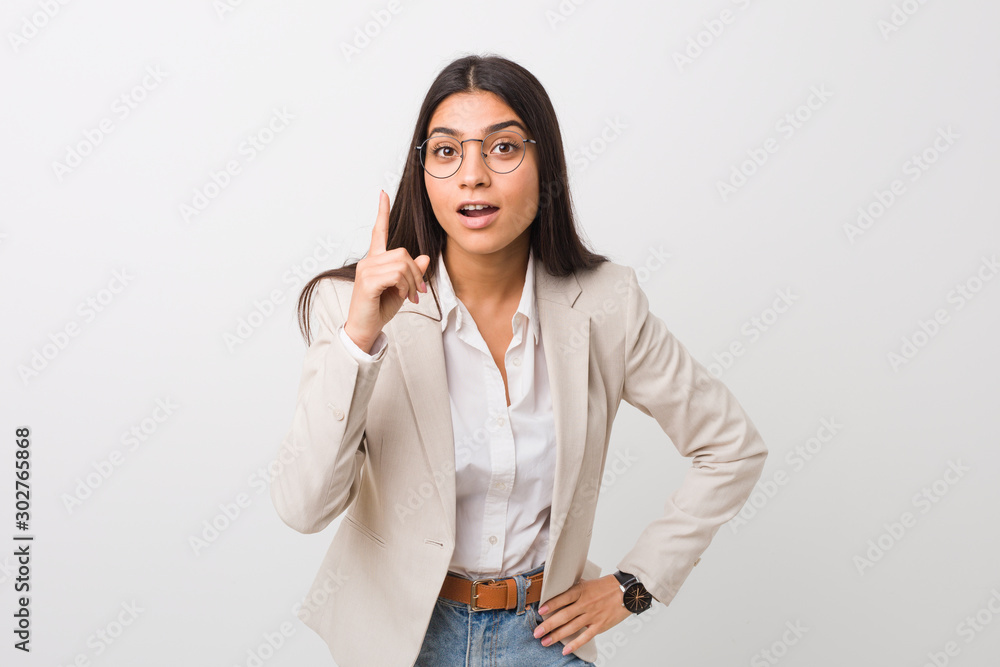 Young business arab woman isolated against a white background having an idea, inspiration concept. Young business arab woman isolated against a white background having an idea, inspiration concept.