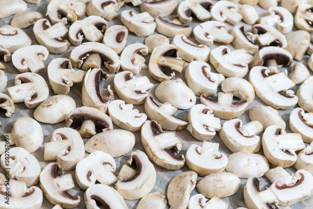 Sliced mushrooms laid out to dry. Close-up photo. Sliced mushrooms laid out to dry. Close-up photo.