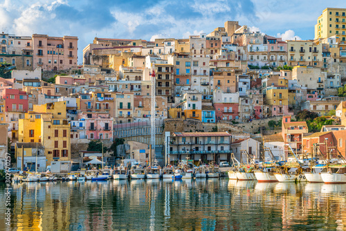 The colorful city of Sciacca overlooking its harbour. Province of Agrigento, Sicily. photo