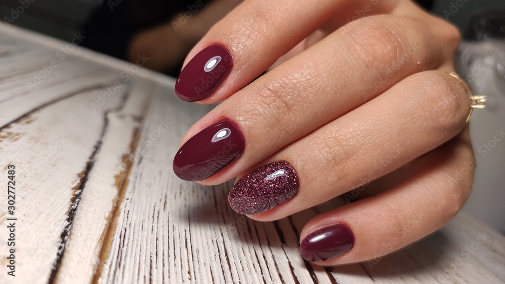 Closeup photo of a beautiful female hands with elegant manicure Closeup photo of a beautiful female hands with elegant manicure