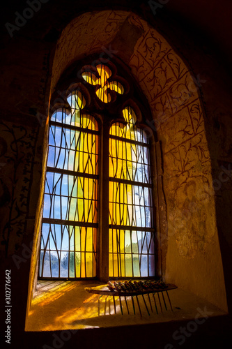 Beautiful stained glass window at the old Gothic Chapel of St. Eligius in Krewinkel  Belgium