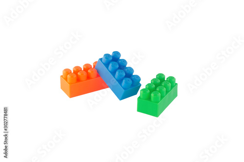 oblong blocks of the children's designer of orange, blue and green on a white background. isolate