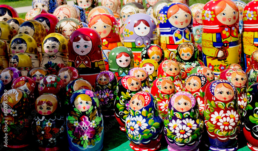 A large number of colorful Russian dolls close-up
