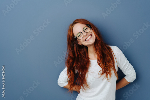 Happy attractive young redhead woman Fototapeta