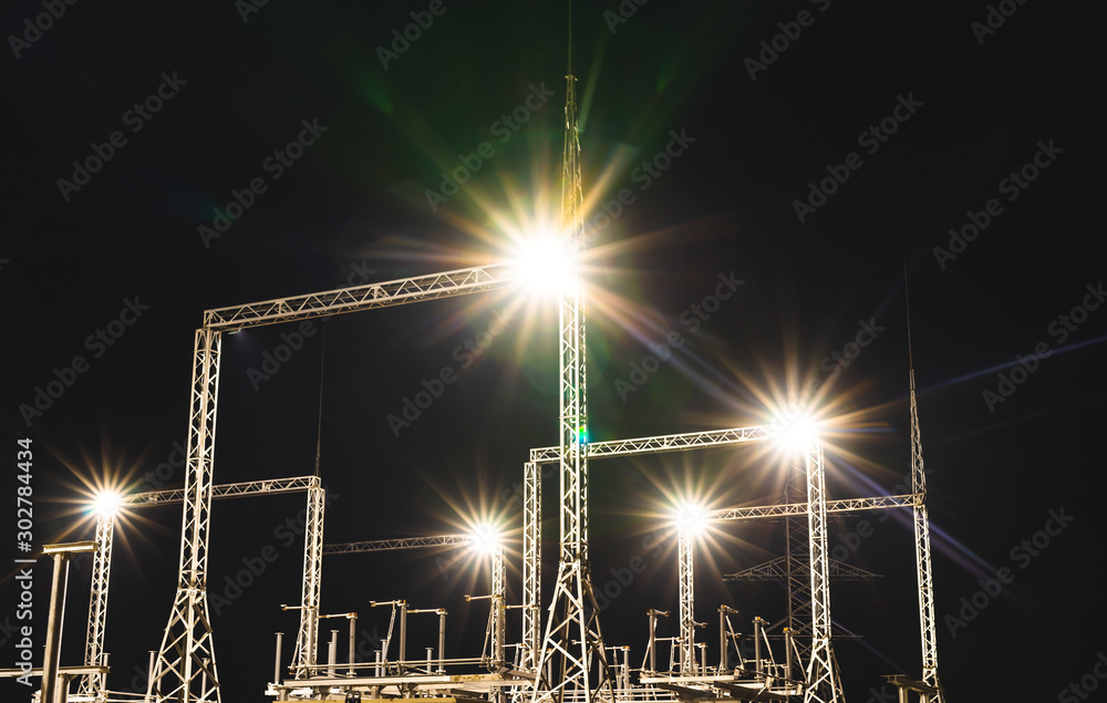 New unfinished power substation with night lighting