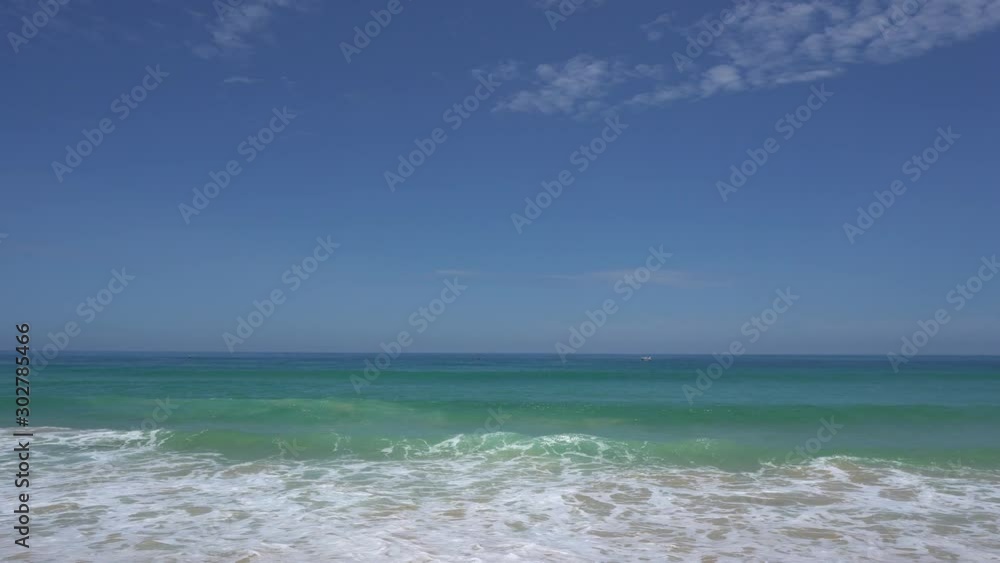 Phuket beach sea, View of beach sea on sun light in the summer. At Karon Beach, Phuket, Thailand. 4K UHD, Video Clip. Phuket beach sea, View of beach sea on sun light in the summer. At Karon Beach, Phuket, Thailand. 4K UHD, Video Clip.