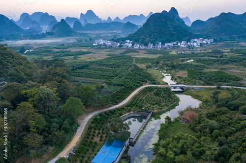 Drone Sunset View of Guilin, Li River and Karst mountains, Guilin city, Guangxi, province, China photo