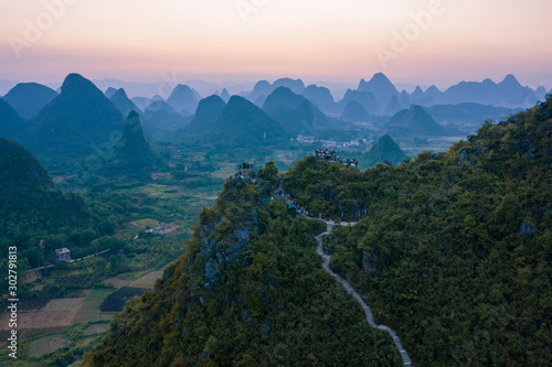 Drone Sunset View of Guilin, Li River and Karst mountains, Guilin city, Guangxi, province, China photo