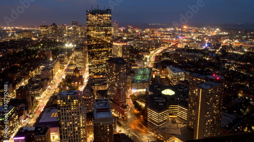 a night time view of boston's financial district from the observation deck of skywalk in boston