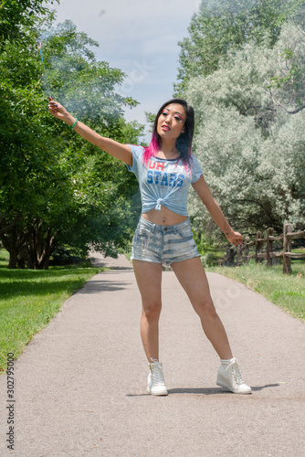 Beautiful asian girl posing in the American Independence Day © ParshuRam