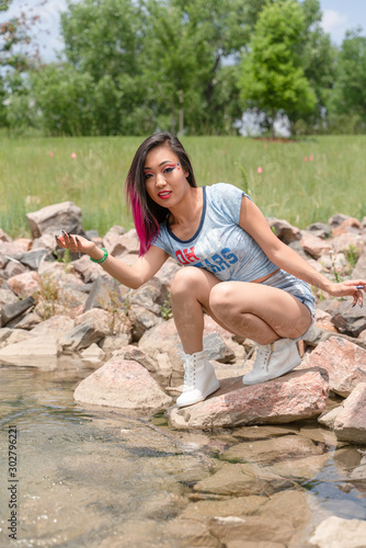 Beautiful asian girl posing in the American Independence Day