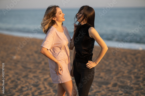 two beautiful young girls on the beach