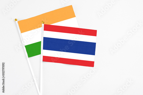 Free Download Thailand and India stick flags on white background. High quality fabric, miniature national flag. Peaceful global concept.White floor for copy space. - GFXLoad