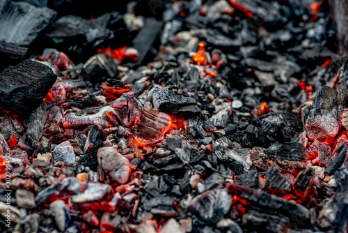 burning coals, fading charcoal, barbecue season. close-up photo