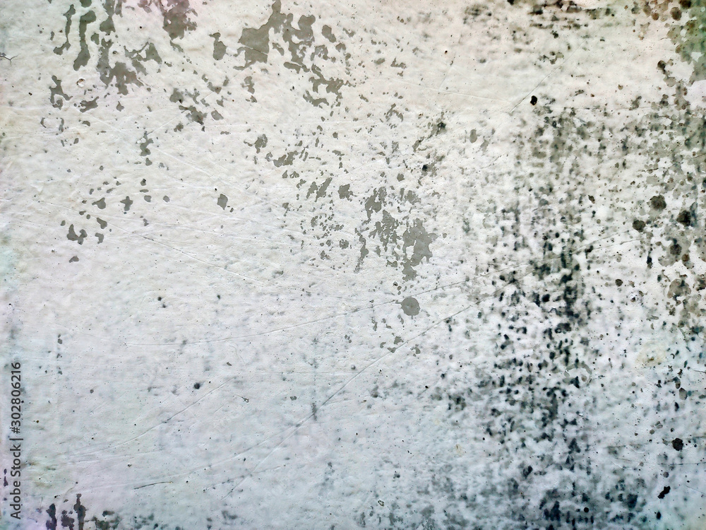 Fototapeta premium Close up White floor broken and white floor peeling along the wall flap for background.
