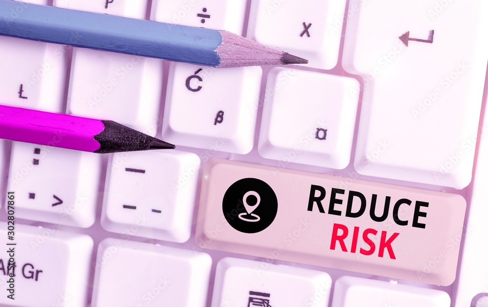 Text sign showing Reduce Risk. Business photo text lessen the potential damage that could be caused by a hazard Text sign showing Reduce Risk. Business photo text lessen the potential damage that could be caused by a hazard