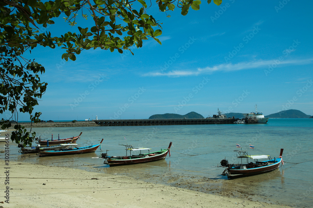 Local long tail boat is in the south of Thailand. Use for fishing and tour on the beach. Local long tail boat is in the south of Thailand. Use for fishing and tour on the beach.