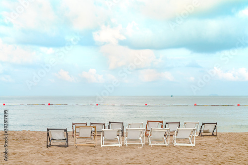 White beach chair  with blue sky and sea view © sirawut
