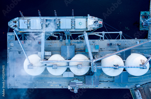 Ship loads at dock