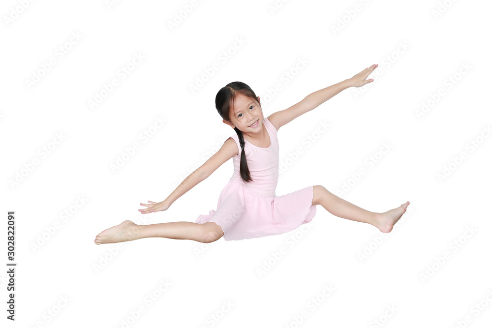 Little asian girl in pink leotard practise her ballet dance isolated on white background. Children is studying ballet. Little asian girl in pink leotard practise her ballet dance isolated on white background. Children is studying ballet.