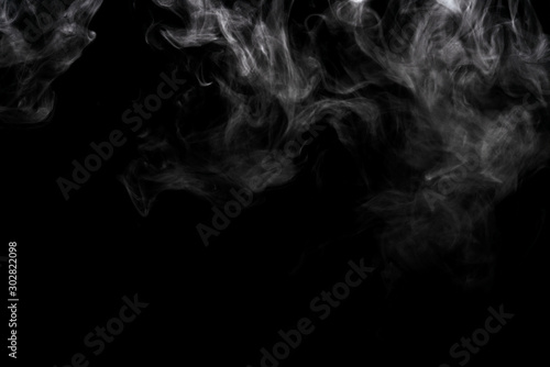 Abstract powder or smoke effect isolated on black background