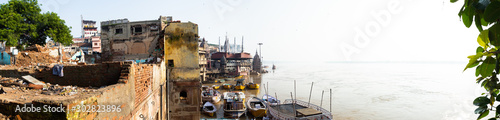 India, Varanasi, Manikarnika Ghat -boats on Ganges river