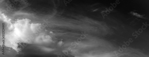 Panorama white cloud and black sky textured background