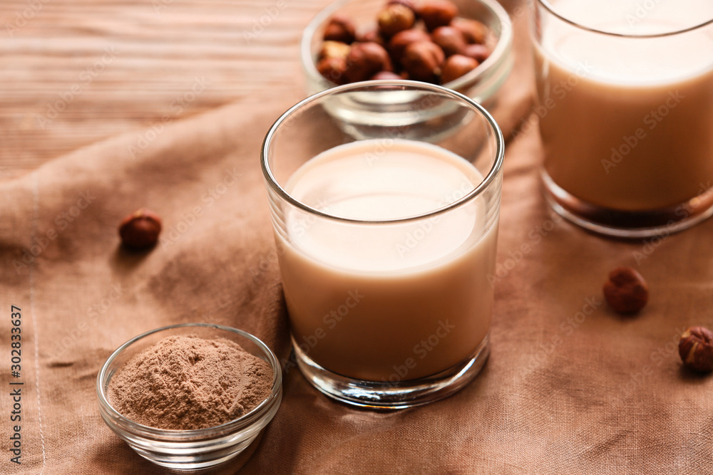 Glass of protein shake on table Glass of protein shake on table