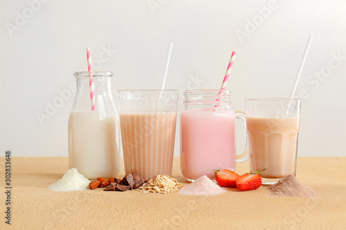 Φωτογραφία Assortment of protein shakes on table